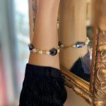 Βραχιόλι με μεγάλα blue black κρύσταλλα και καρδιές tiny επίχρυσες.