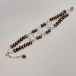 Διπλό λουσάτο βραχιόλι από copper shinny κρύσταλλα και ορθογώνια κρυστάλλινα μοτίφ.
